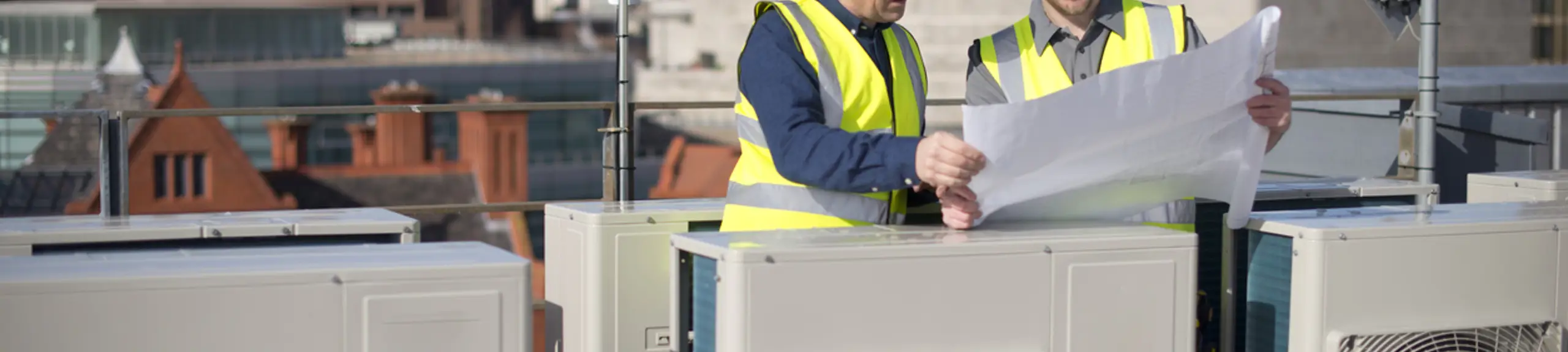2 people performing TM44 Air Conditioning Capacity Inspection 2 people performing TM44 Air Conditioning Capacity Inspection